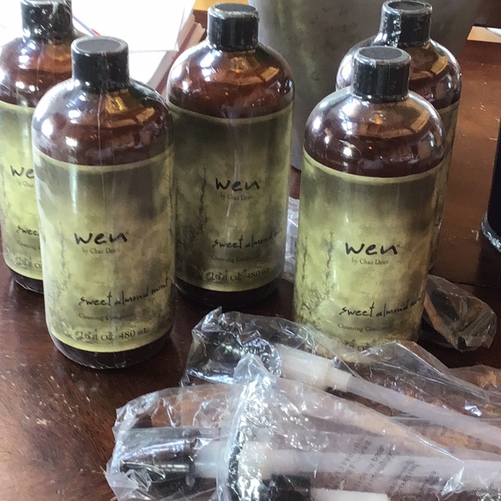 Wen moisturizing hair care, new in wrapper with a pump. 13 bottles and 13 pumps.